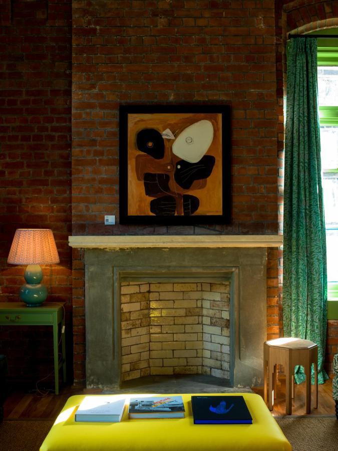 The Observatory Hotel Christchurch Exterior photo A fireplace at the house